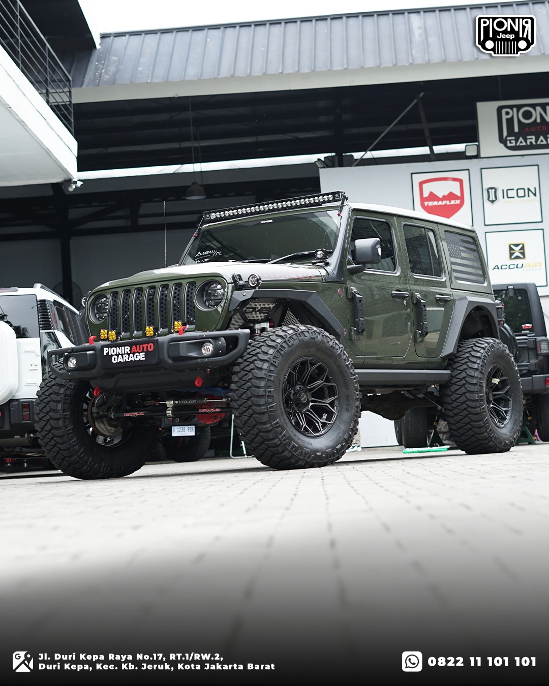 Jeep Wrangler JL Rubicon warna hijau olive dengan hasil modifikasi offroad monster dan velg keren di Pionir Auto Garage
